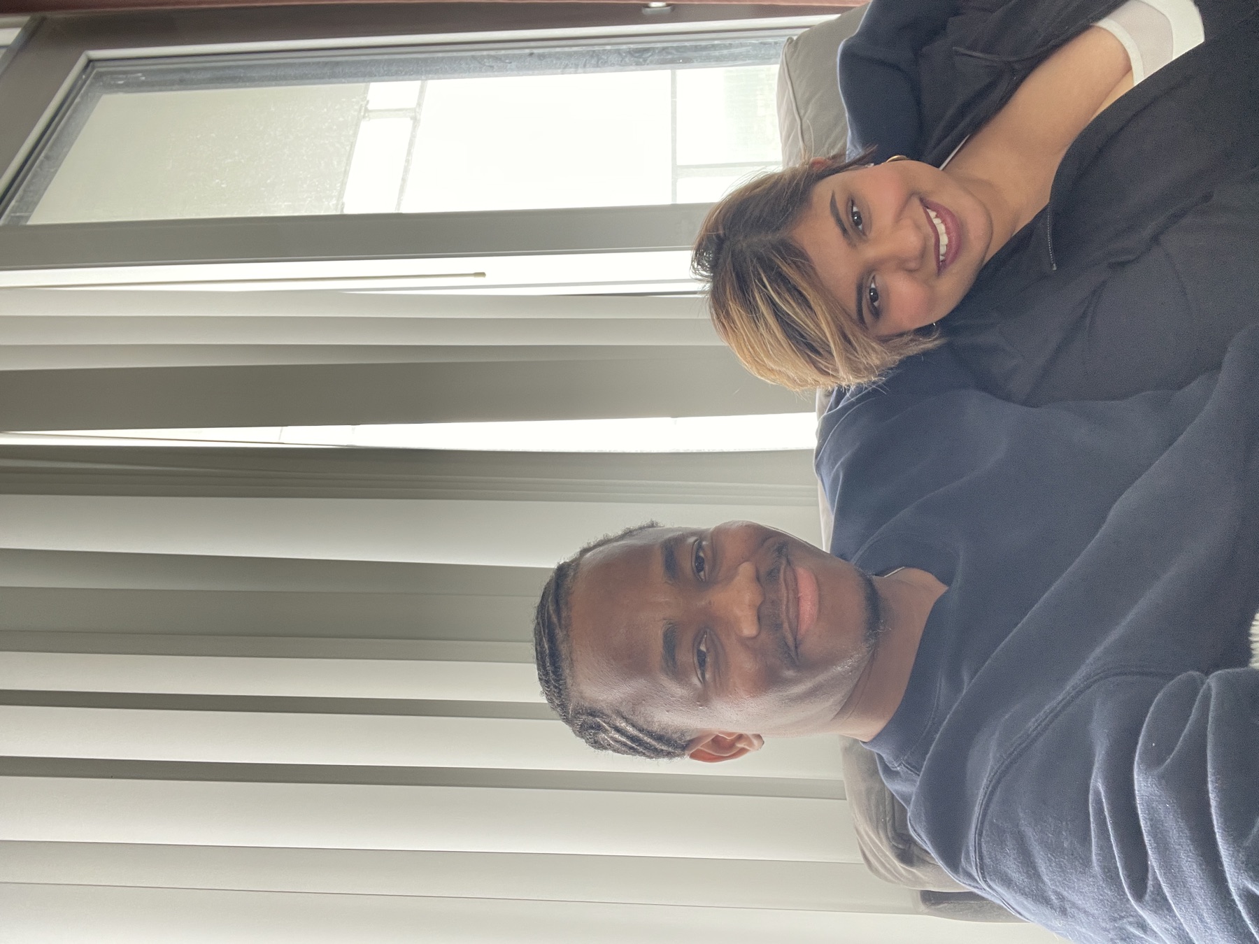 Victor and Andrea relaxing at home together after the proposal
